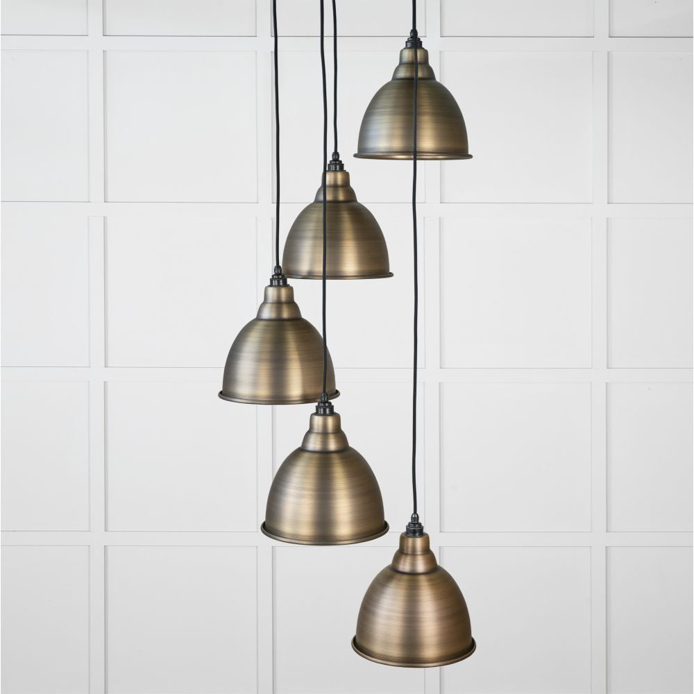 This is an image showing From The Anvil - Aged Brass Brindley Cluster Pendant available from trade door handles, quick delivery and discounted prices