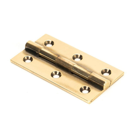 This is an image showing From The Anvil - Aged Brass 2.5" Butt Hinge (pair) available from trade door handles, quick delivery and discounted prices