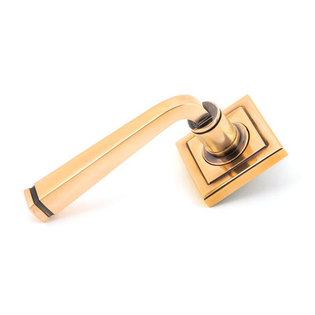 This is an image showing From The Anvil - Polished Bronze Avon Round Lever on Rose Set (Square) - Unsprun available from trade door handles, quick delivery and discounted prices