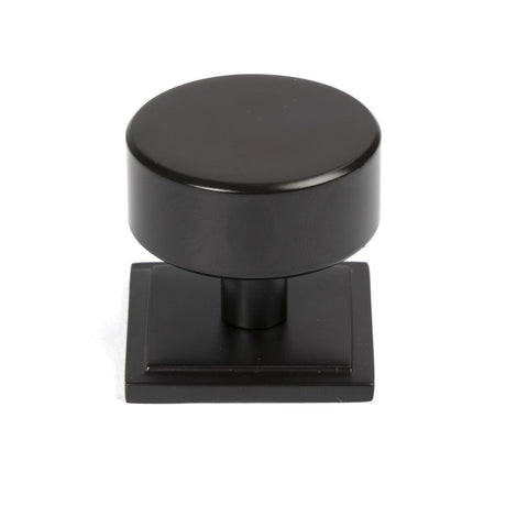 This is an image showing From The Anvil - Aged Bronze Kelso Cabinet Knob - 38mm (Square) available from trade door handles, quick delivery and discounted prices