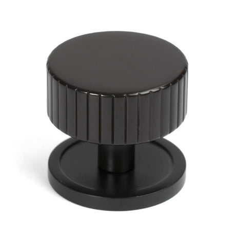 This is an image showing From The Anvil - Aged Bronze Judd Cabinet Knob - 38mm (Plain) available from trade door handles, quick delivery and discounted prices