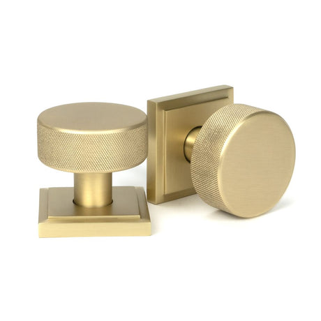 This is an image showing From The Anvil - Satin Brass Brompton Mortice/Rim Knob Set (Square) available from trade door handles, quick delivery and discounted prices