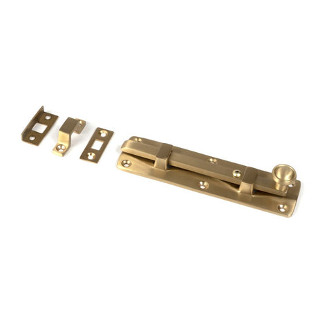 This is an image showing From The Anvil - Satin Brass 6" Universal Bolt available from trade door handles, quick delivery and discounted prices