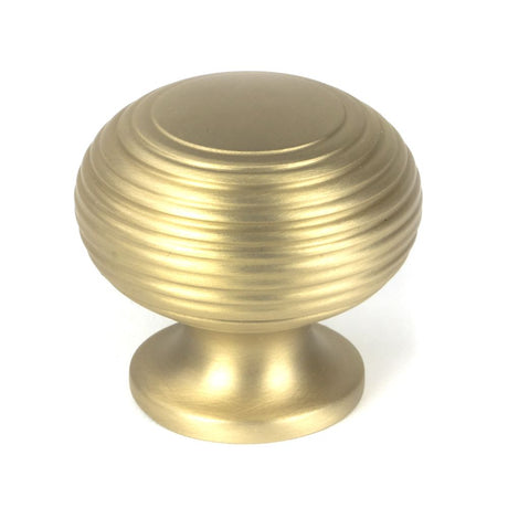 This is an image showing From The Anvil - Satin Brass Beehive Cabinet Knob 40mm available from trade door handles, quick delivery and discounted prices