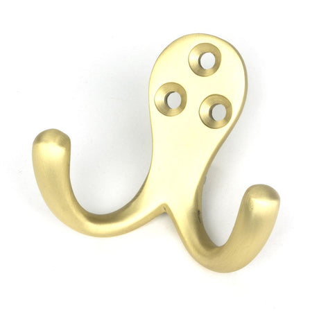 This is an image showing From The Anvil - Satin Brass Celtic Double Robe Hook available from trade door handles, quick delivery and discounted prices