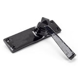This is an image showing From The Anvil - Black Straight Lever Latch Set available from trade door handles, quick delivery and discounted prices