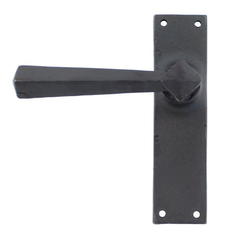 This is an image showing From The Anvil - Beeswax Straight Lever Latch Set available from trade door handles, quick delivery and discounted prices