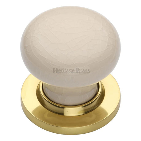 This is an image of a Heritage Brass - Cream Crackle Knob with Polished Brass base, 8010-pb that is available to order from Trade Door Handles in Kendal.