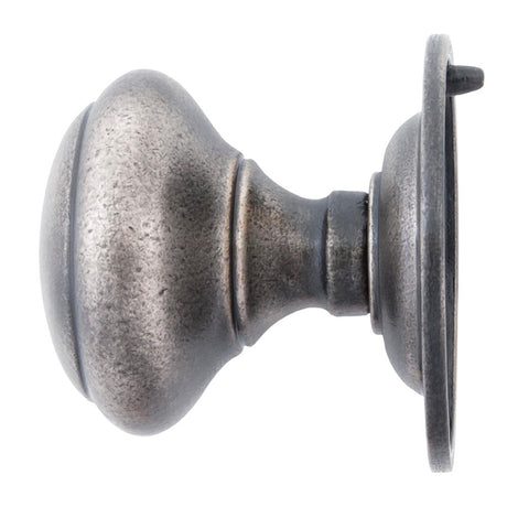 This is an image showing From The Anvil - Antique Pewter Round Centre Door Knob available from trade door handles, quick delivery and discounted prices
