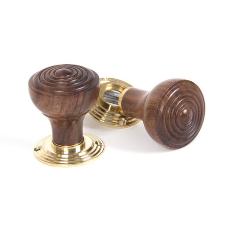 This is an image showing From The Anvil - Rosewood Ringed Mortice/Rim Knob Set available from trade door handles, quick delivery and discounted prices