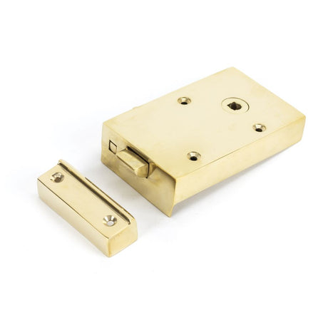 This is an image showing From The Anvil - Polished Brass Right Hand Bathroom Latch available from trade door handles, quick delivery and discounted prices