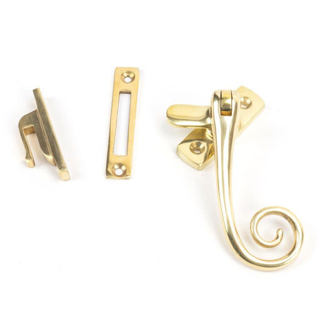 This is an image showing From The Anvil - Polished Brass Monkeytail Fastener available from trade door handles, quick delivery and discounted prices
