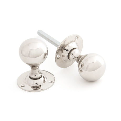 This is an image showing From The Anvil - Polished Nickel Ball Mortice Knob Set available from trade door handles, quick delivery and discounted prices
