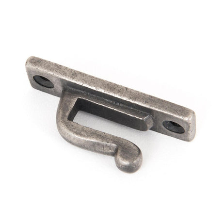 This is an image showing From The Anvil - Antique Pewter Hook Plate available from trade door handles, quick delivery and discounted prices