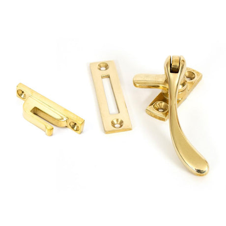 This is an image showing From The Anvil - Polished Brass Peardrop Fastener available from trade door handles, quick delivery and discounted prices