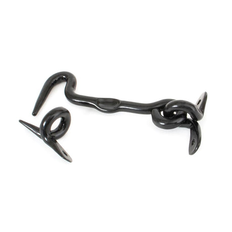 This is an image showing From The Anvil - Black 4" Forged Cabin Hook available from trade door handles, quick delivery and discounted prices