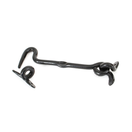 This is an image showing From The Anvil - Black 6" Forged Cabin Hook available from trade door handles, quick delivery and discounted prices