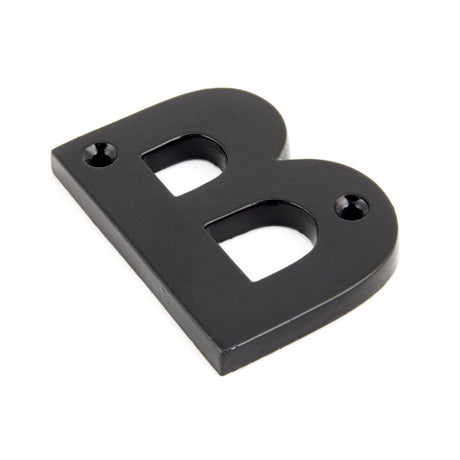 This is an image showing From The Anvil - Black Letter B available from trade door handles, quick delivery and discounted prices