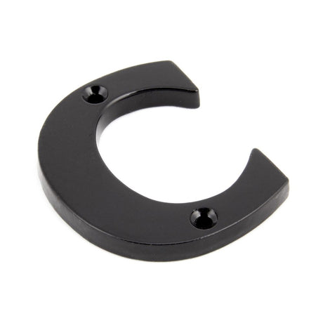 This is an image showing From The Anvil - Black Letter C available from trade door handles, quick delivery and discounted prices