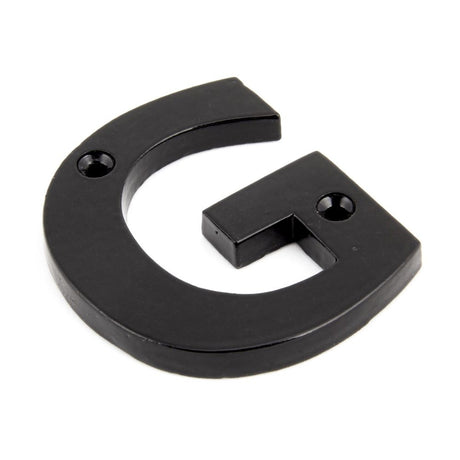 This is an image showing From The Anvil - Black Letter G available from trade door handles, quick delivery and discounted prices