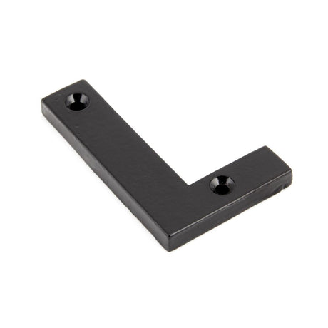 This is an image showing From The Anvil - Black Letter L available from trade door handles, quick delivery and discounted prices