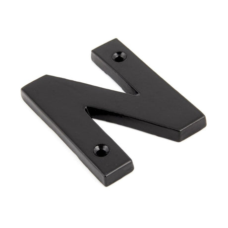 This is an image showing From The Anvil - Black Letter N available from trade door handles, quick delivery and discounted prices