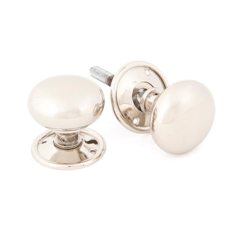 This is an image showing From The Anvil - Polished Nickel Mushroom Mortice/Rim Knob Set available from trade door handles, quick delivery and discounted prices