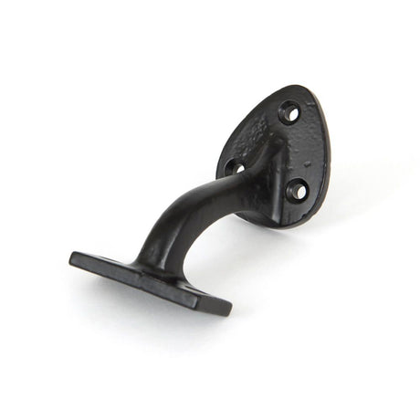 This is an image showing From The Anvil - Black 2" Handrail Bracket available from trade door handles, quick delivery and discounted prices