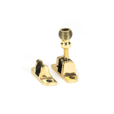 This is an image showing From The Anvil - Aged Brass Beehive Brighton Fastener (Radiused) available from trade door handles, quick delivery and discounted prices