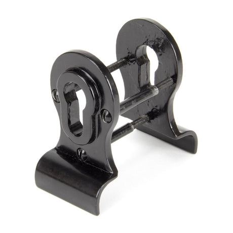 This is an image showing From The Anvil - Black 50mm Euro Door Pull (Back to Back fixings) available from trade door handles, quick delivery and discounted prices