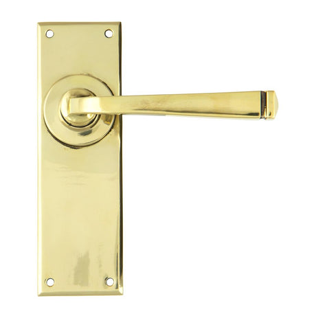 This is an image showing From The Anvil - Aged Brass Avon Lever Latch Set available from trade door handles, quick delivery and discounted prices