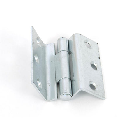 This is an image showing From The Anvil - Bright Zinc Plated 2 1/2" Stormproof Hinge 1951 (pair) available from trade door handles, quick delivery and discounted prices