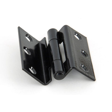 This is an image showing From The Anvil - Black 2 1/2" Stormproof Hinge 1951 (Pair) available from trade door handles, quick delivery and discounted prices