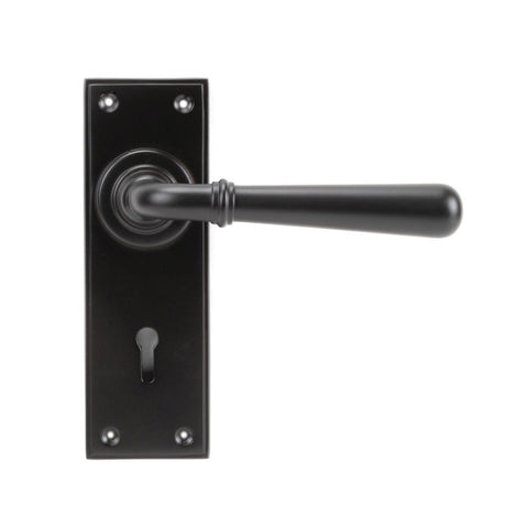 This is an image showing From The Anvil - Aged Bronze Newbury Lever Lock Set available from trade door handles, quick delivery and discounted prices