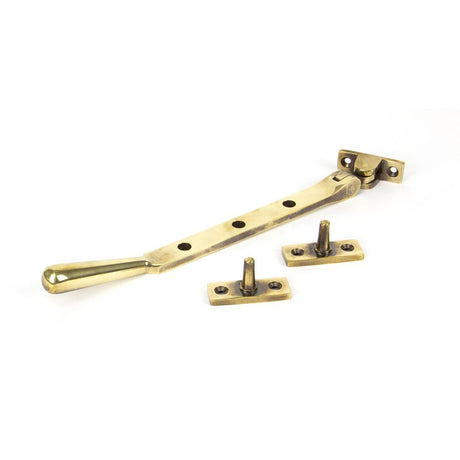 This is an image showing From The Anvil - Aged Brass 8" Newbury Stay available from trade door handles, quick delivery and discounted prices