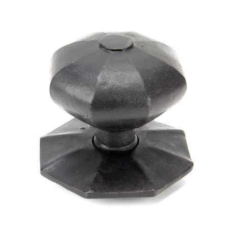 This is an image showing From The Anvil - External Beeswax Octagonal Centre Door Knob available from trade door handles, quick delivery and discounted prices