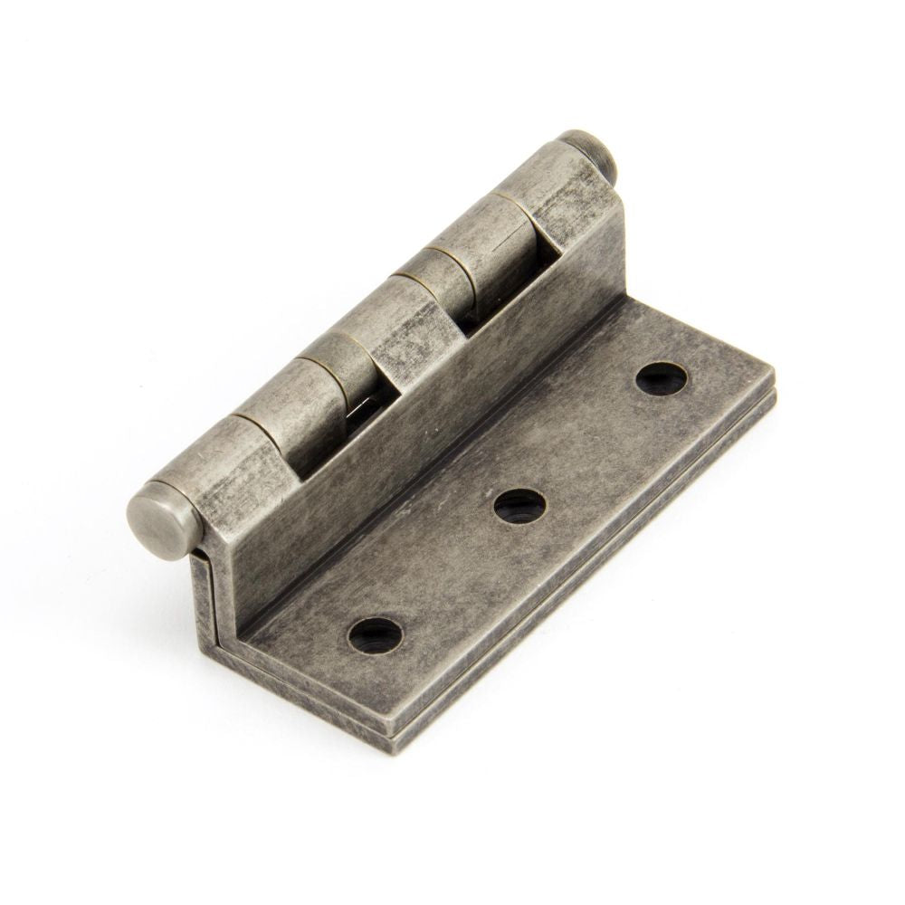 This is an image showing From The Anvil - Antique Pewter 2 1/2" Stormproof Hinge 1951 (pair) available from trade door handles, quick delivery and discounted prices