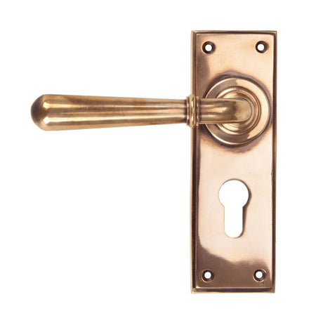 This is an image showing From The Anvil - Polished Bronze Newbury Lever Euro Lock Set available from trade door handles, quick delivery and discounted prices