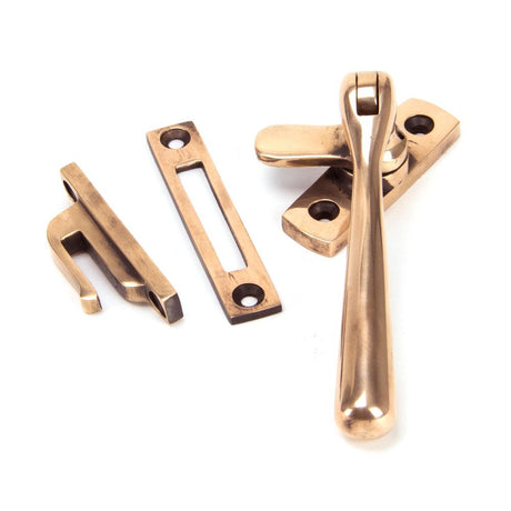 This is an image showing From The Anvil - Polished Bronze Locking Newbury Fastener available from trade door handles, quick delivery and discounted prices