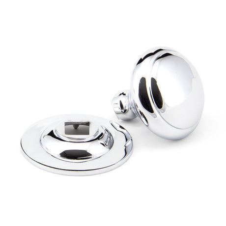 This is an image showing From The Anvil - Polished Chrome Round Centre Door Knob available from trade door handles, quick delivery and discounted prices