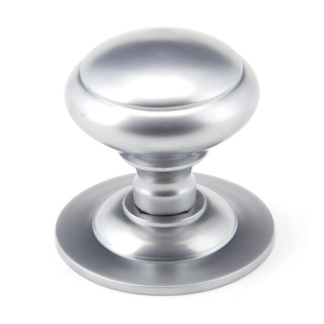 This is an image showing From The Anvil - Satin Chrome Round Centre Door Knob available from trade door handles, quick delivery and discounted prices