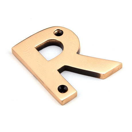 This is an image showing From The Anvil - Polished Bronze Letter R available from trade door handles, quick delivery and discounted prices