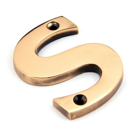 This is an image showing From The Anvil - Polished Bronze Letter S available from trade door handles, quick delivery and discounted prices
