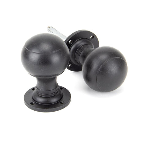 This is an image showing From The Anvil - External Beeswax Regency Mortice/Rim Knob Set available from trade door handles, quick delivery and discounted prices