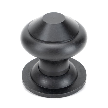This is an image showing From The Anvil - External Beeswax Regency Centre Door Knob available from trade door handles, quick delivery and discounted prices