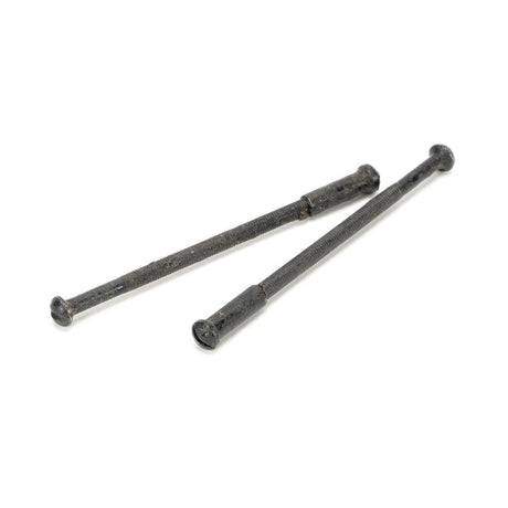 This is an image showing From The Anvil - External Beeswax 5mm Male & Female Screws (2) available from trade door handles, quick delivery and discounted prices