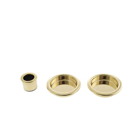This is an image of AGB Sliding Door Flush Pull Round - Polished Brass available to order from Trade Door Handles.