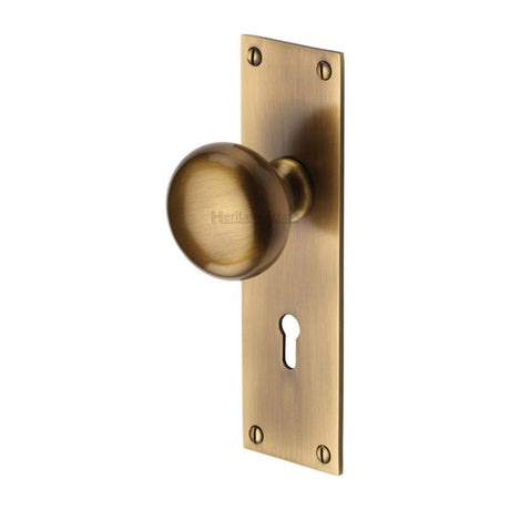 This is an image of a Heritage Brass - Mortice Knob on Lock Plate Balmoral Design Antique Brass Finish, bal8500-at that is available to order from Trade Door Handles in Kendal.