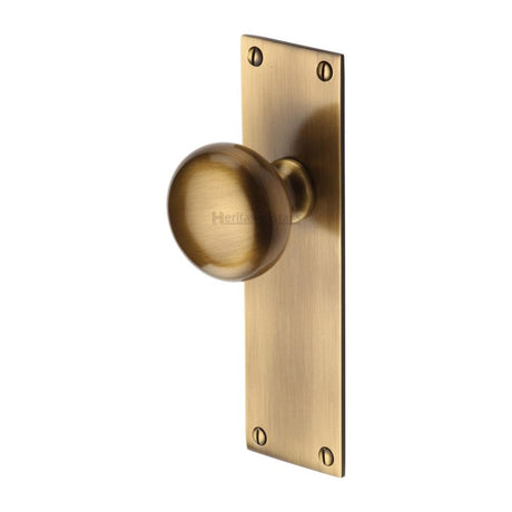 This is an image of a Heritage Brass - Mortice Knob on Latch Plate Balmoral Design Antique Brass Finish, bal8510-at that is available to order from Trade Door Handles in Kendal.