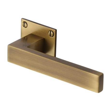 This is an image of a Heritage Brass - Door Handle Lever Latch on Square Rose Delta BH Design Antique finish, bau1928-at that is available to order from Trade Door Handles in Kendal.